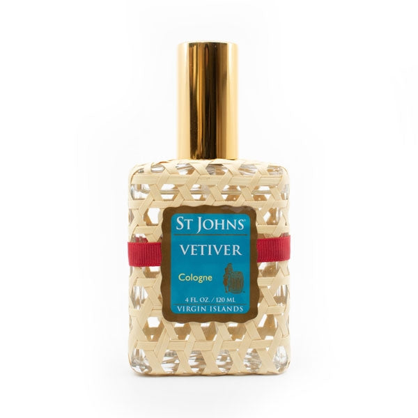 St Johns - Vetiver Kölnflakon mit goldenem Deckel und gewebtem Muster, blauem Etikett und rotem Bindeband vor weißem Hintergrund