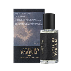 L'Atelier Parfum - Opus 2 - White Mirage Flakon mit schwarzem Verschluss und elegantem Etikett vor dunkler Verpackung