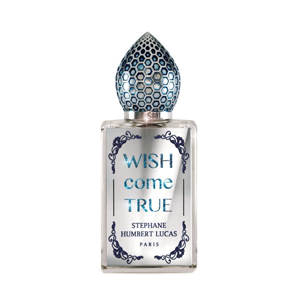 Stéphane Humbert Lucas 777 - WISH come TRUE Parfumflakon mit silbernem, sechseckigem Verschluss und blauem Schriftzug vor weißem Hintergrund