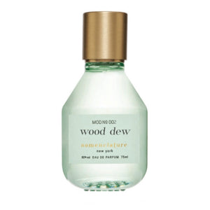 Nomenclature - wood dew Parfumflakon mit klarem Glas und mattem goldfarbenem Verschluss in minimalistischer Form