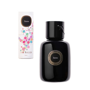 Sabé Masson - Zazou - La Rencontre Parfumflasche in glänzend schwarzem Design mit bunter Blumenverpackung auf weißem Grund