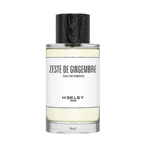 Heeley - Zeste de Gingembre Parfumflakon mit klarer Flüssigkeit und schwarzem Holzverschluss vor weißem Hintergrund