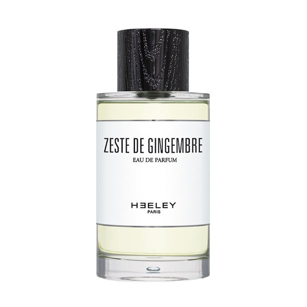 Heeley - Zeste de Gingembre Parfumflakon mit klarer Flüssigkeit und schwarzem Holzverschluss vor weißem Hintergrund